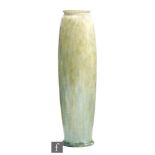 Ruskin Pottery - A tall lamp base of cucumber form decorated in a streaked green blue crystalline
