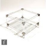 Attributed to Pierre Vandel - A French 1970s gilt metal, chrome and lucite coffee table, the two