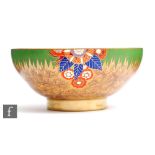 Carlton Ware - A large Art Deco footed bowl decorated in the Floral Comets pattern, printed script