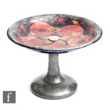 William Moorcroft - Liberty & Co - A Pomegranate pattern comport raised to a Tudric pewter stand