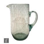 Keith Murray - Stevens and Williams - A 1930s glass jug of swollen sleeve form with applied loop