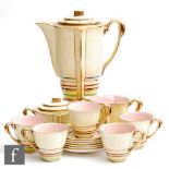 Carlton Ware - A 1930s Art Deco Parisienne shape coffee set decorated in the Vertical Stripes
