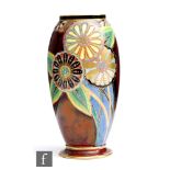 Carlton Ware - A 1930s Art Deco vase of tapering footed form decorated in the Wagon Wheel pattern,