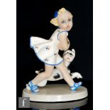 C.I.A Manna - A 1930s/1950s Art Deco model of a young girl running with her dog, with her skirt