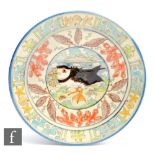 Maureen Minchin - A contemporary studio pottery plate decorated with a puffin flanked by a border of