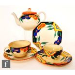 Clarice Cliff - Garland - A part bachelor tea service circa 1929, comprising globe teapot, cup and
