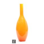 Iittala - A glass vase of skittle form, orange cased in clear with an opal interior, height 50.5cm.