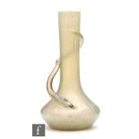 Loetz - An early 20th Century glass vase of low shouldered form with tall collar neck decorated with