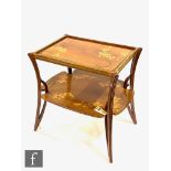 Louis Majorelle - A walnut and marquetry inlaid two tier étagère or occasional table of