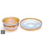 Louis Comfort Tiffany - A Favrile finger bowl of circular section with flared rim and nipped whirl