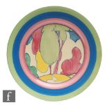 Clarice Cliff - Pastel Autumn - A 9 inch circular plate circa 1932, hand painted with a stylised