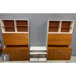 In the manner of White and Newton - A teak and white laminate three section modular display unit,