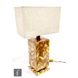 Manner of Anthony Redmile - A simulated horn square section lamp base, the variegated veneered