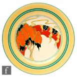 Clarice Cliff - Solitude - A circular plate circa 1933, hand painted with a stylised tree before a