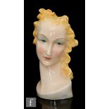Unknown - A 1950s Italian bust of a lady with blonde hair, indistinctly signed and painted