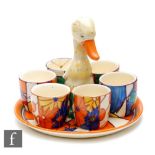 Clarice Cliff - Mr Puddleduck - Mixed designs - A novelty egg cup set circa 1929, with a circular