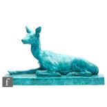 Santiago Rodriguez Bonome - A French Art Deco model of a seated deer, the whole glazed in a speckled