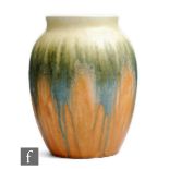 Ruskin Pottery - A crystalline glaze barrel vase decorated in a streaked yellow to blue to orange