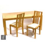 Ercol Furniture - A light oak Bosco range extending rectangular dining table and six chairs with