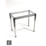 Unknown - A chrome and glass console table, the quatrefoil tubular supports extending to brushed