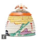 Clarice Cliff - Summerhouse - A small size Beehive honey pot circa 1932, hand painted with a
