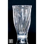 Olle Alberius - Orrefors - A 1960s clear glass vase of wrythen form with facet cut panels, signed,