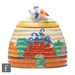 Clarice Cliff - Gay Day - A small size Beehive honey pot circa 1930, hand painted with a band of