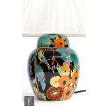 Carlton Ware - An Art Deco table lamp shaped as a ginger jar and affixed cover decorated in the