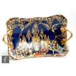 Carlton Ware - An Art Deco rectangular footed twin handled dish decorated in the Fantasia pattern,