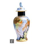 Carlton Ware - An Art Deco vase and cover decorated in the Paradise Bird and Tree pattern, the cover