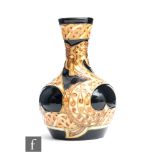 Kerry Goodwin - Moorcroft Pottery - A small vase of globe and shaft form decorated in the Golden