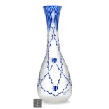 Legras - A 1930s cameo glass vase of slender bottle form cased in deep blue over a clear, acid cut