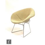 Harry Bertoia - A chromium plated wirework Diamond Chair, with oatmeal coloured hopsack style