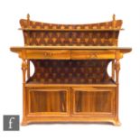 In the manner of Louis Majorelle - A marquetry inlaid buffet sideboard, the upright section with