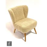 Heals - A contemporary Ziggy occasional chair, upholstered in sheep's wool above splayed and tapered