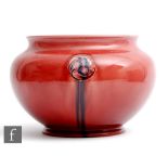 William Moorcroft - A large early 20th Century Flamminion pattern jardinière in red with tubelined