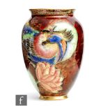 Carlton Ware - An Art Deco vase of swollen form decorated in the Crested Bird and Waterlily pattern,