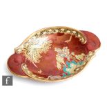Carlton Ware - An Art Deco oval dish with moulded scroll handles decorated in the Paradise Bird