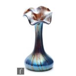 In the manner of Kralik - A glass vase of low shouldered form with tall collar neck and wide wave