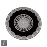 Val St Lambert - A large dish of faceted circular form decorated with bands of deep amethyst flash