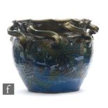 C H Brannam - Barum - An early 20th Century hand thrown jardinière of shouldered ovoid form with a