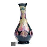 Rachel Bishop - Moorcroft Pottery - A Moorcroft Collectors Club bottle vase decorated in the Fuschia