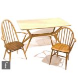 Ercol Furniture and others - A pair of Ercol light elm and beech model 365a Quaker armchairs,