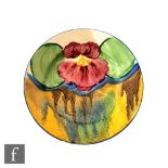 Clarice Cliff - Pansies Delecia - A miniature plate or nut dish circa 1932, hand painted with