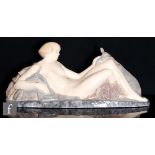G Beauvais - A large French Art Deco model of a nude reclining female circa 1925 with