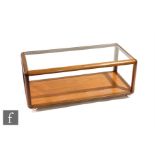 Unknown - A teak coffee table of rectangular cuboid form, probably Danish, with an inset glass top