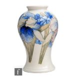 William Moorcroft - A salt glazed vase of inverted baluster form decorated in the Orchid pattern,
