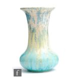 Ruskin Pottery - A crystalline glaze vase of globe and shaft form decorated in a pale yellow to blue