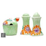 Clarice Cliff - Marguerite - A muffiner cruet set circa 1933, relief moulded with stylised flower