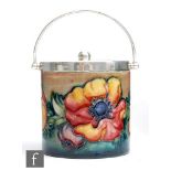 William Moorcroft - A preserve pot and cover decorated in the Flambe Anemone pattern, the rim and